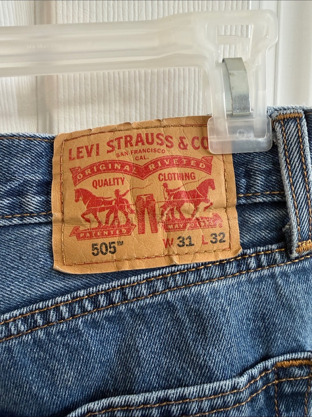 Levi's 505 Men’s Straight Leg Jeans in Medium Blue with Tan Patch